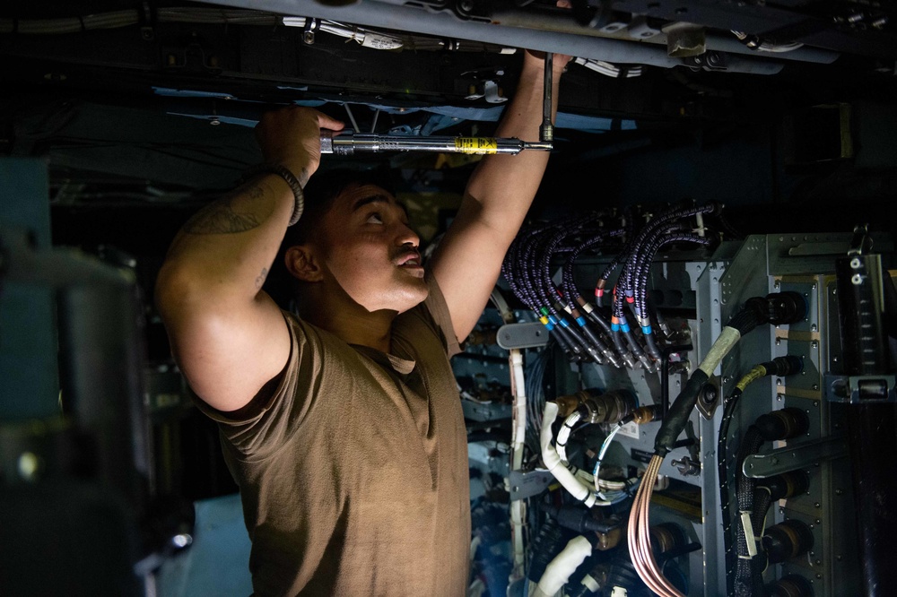 USS Carl Vinson (CVN 70) Sailor Conducts Maintenance