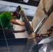 USS Carl Vinson (CVN 70) Sailor Conducts Maintenance