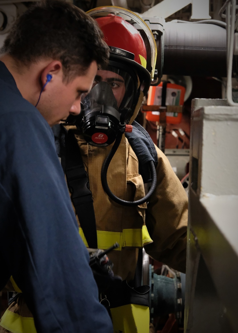 Sailors aboard USS Lake Champlain conduct firefighting drills while in Guam