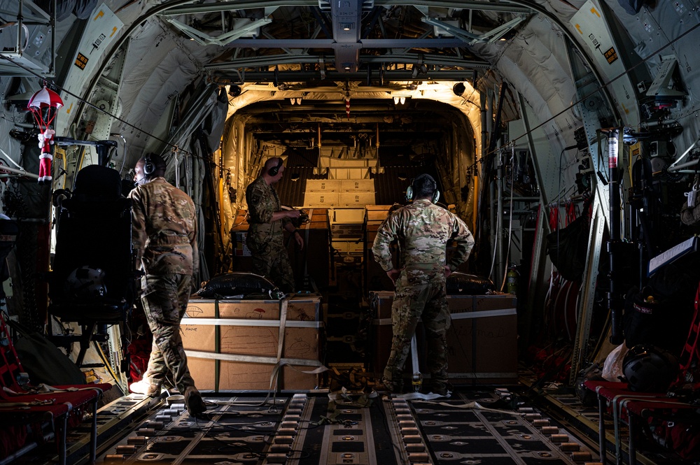 C-130s deliver presents for Operation Christmas Drop 70