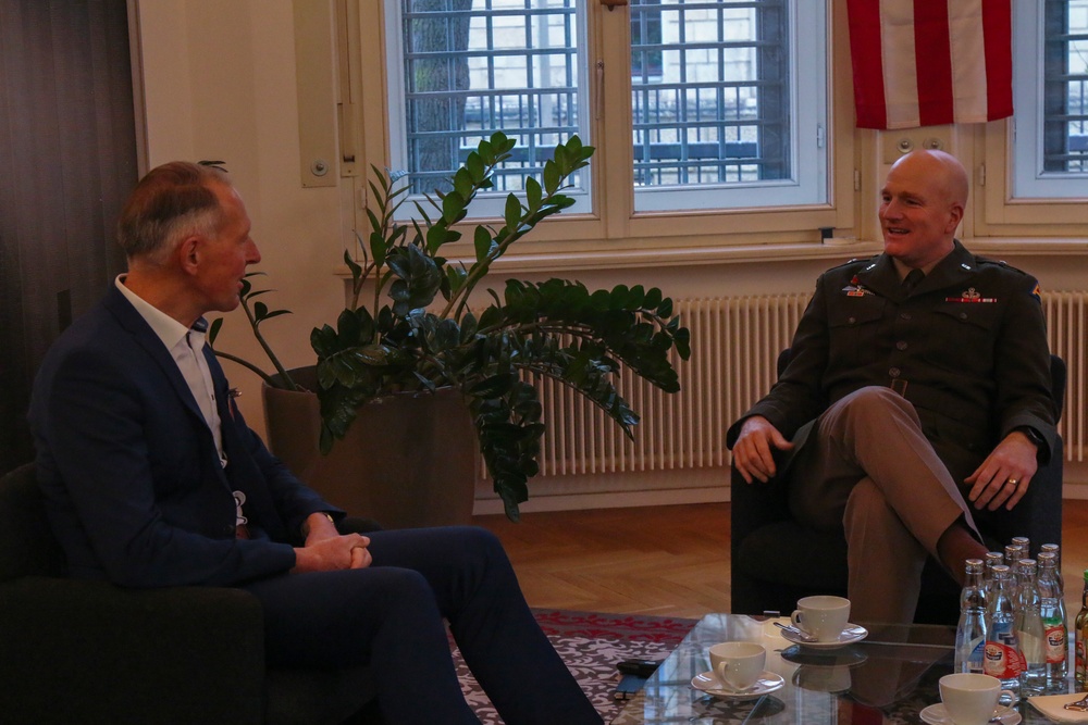 U.S. Army Brig. Gen. Joseph Hilbert, Commander of 7th Army Training Command, Speaks with German Parliament Member Jens Lehmann