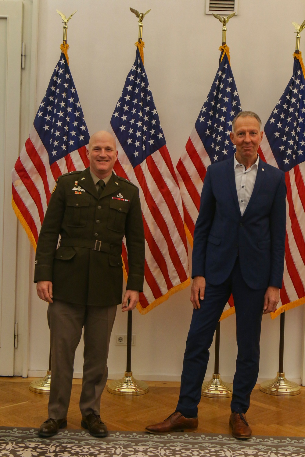 U.S. Army Brig. Gen. Joseph Hilbert, Commander of 7th Army Training Command, Poses for a Photo with German Parliament Member Jens Lehmann