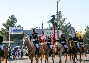 Marine Corps Mounted Color Guard leads the Victorville Christmas Parade