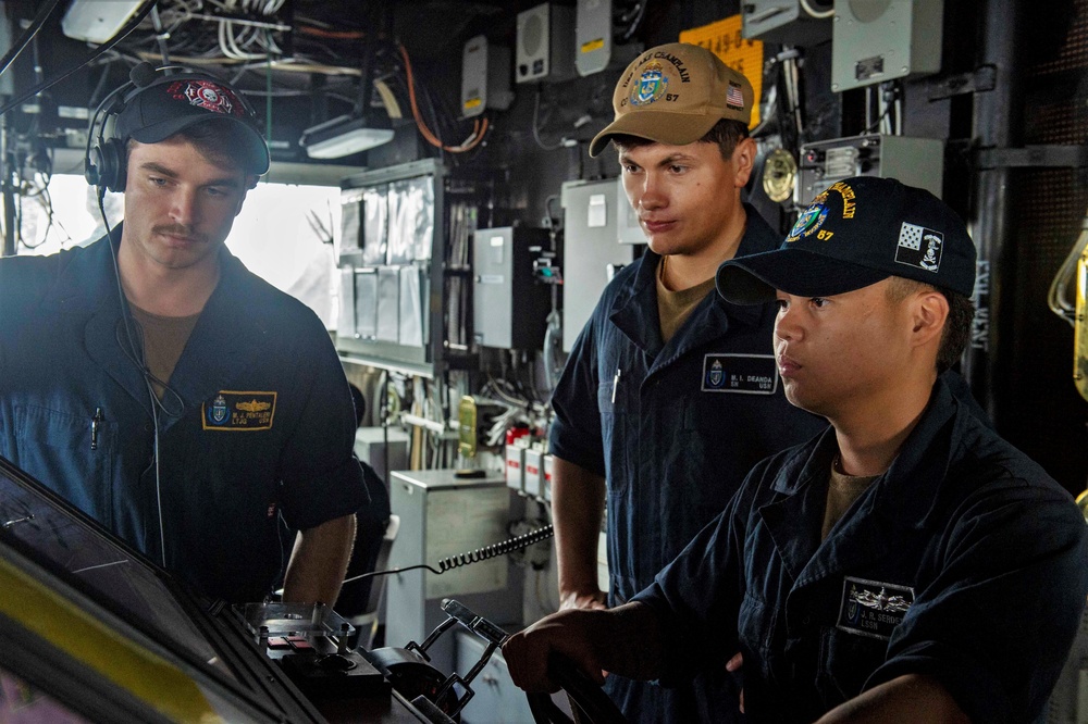 USS Lake Champlain conducts a replenishment-at-sea in Philippine Sea