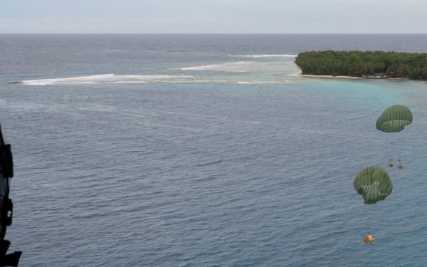 Dropping bundles during Operation Christmas Drop