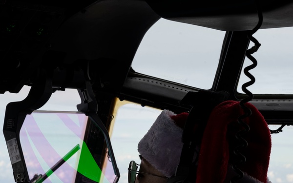 Dropping bundles during Operation Christmas Drop