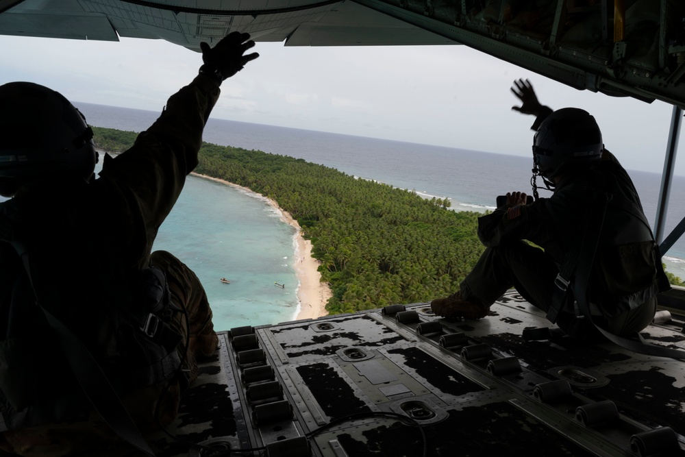 Dropping bundles during Operation Christmas Drop