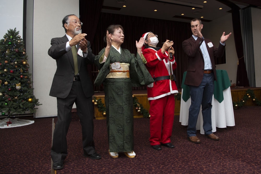 U.S., Japan strengthens friendship during 374th AW Holiday Social