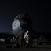 KC-135 refuels Fighting Falcons under darkness