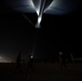 KC-135 refuels Fighting Falcons under darkness