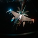 KC-135 refuels Fighting Falcons under darkness