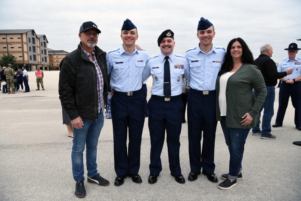 Identical twins share similar journey to become Airmen