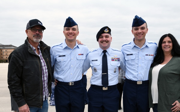 Identical twins share similar journey to become Airmen