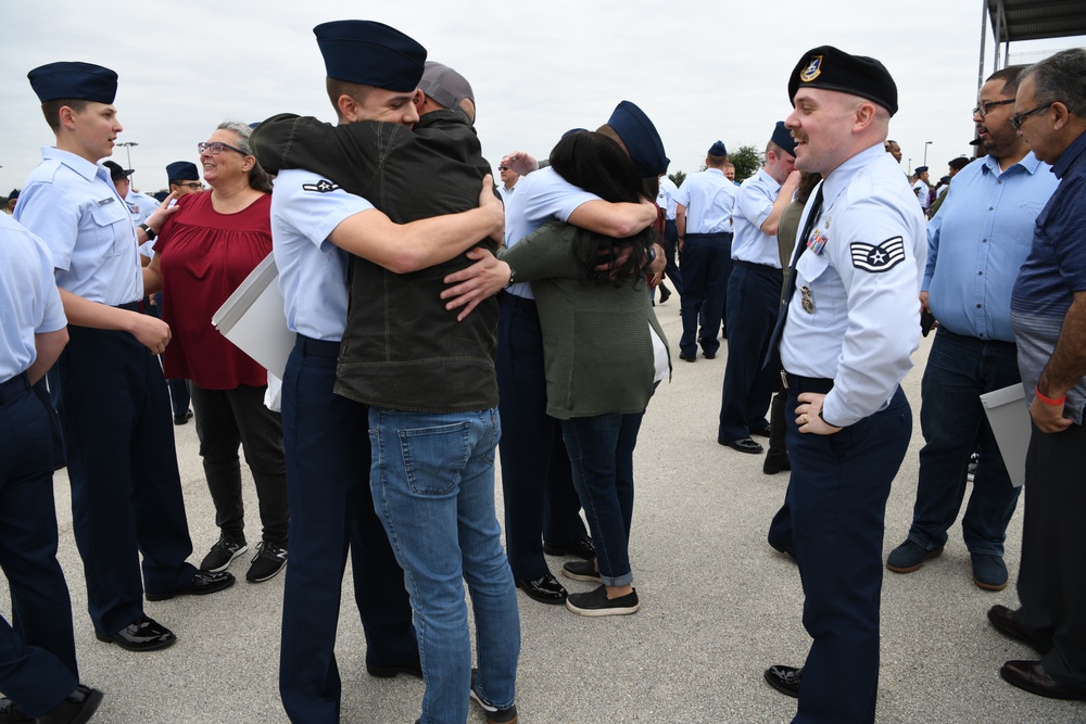 Identical twins share similar journey to become Airmen