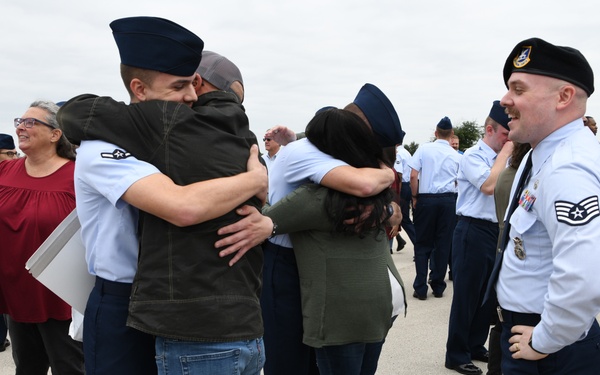 Identical twins share similar journey to become Airmen
