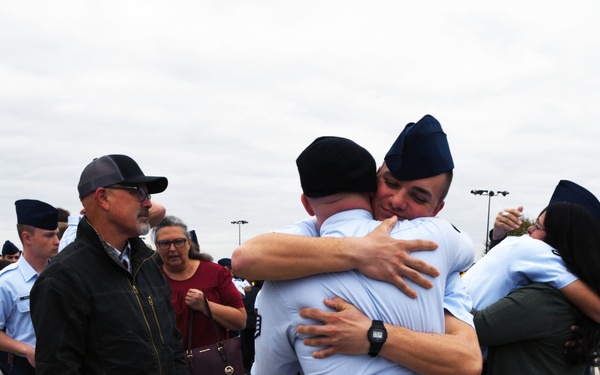 Identical twins share similar journey to become Airmen