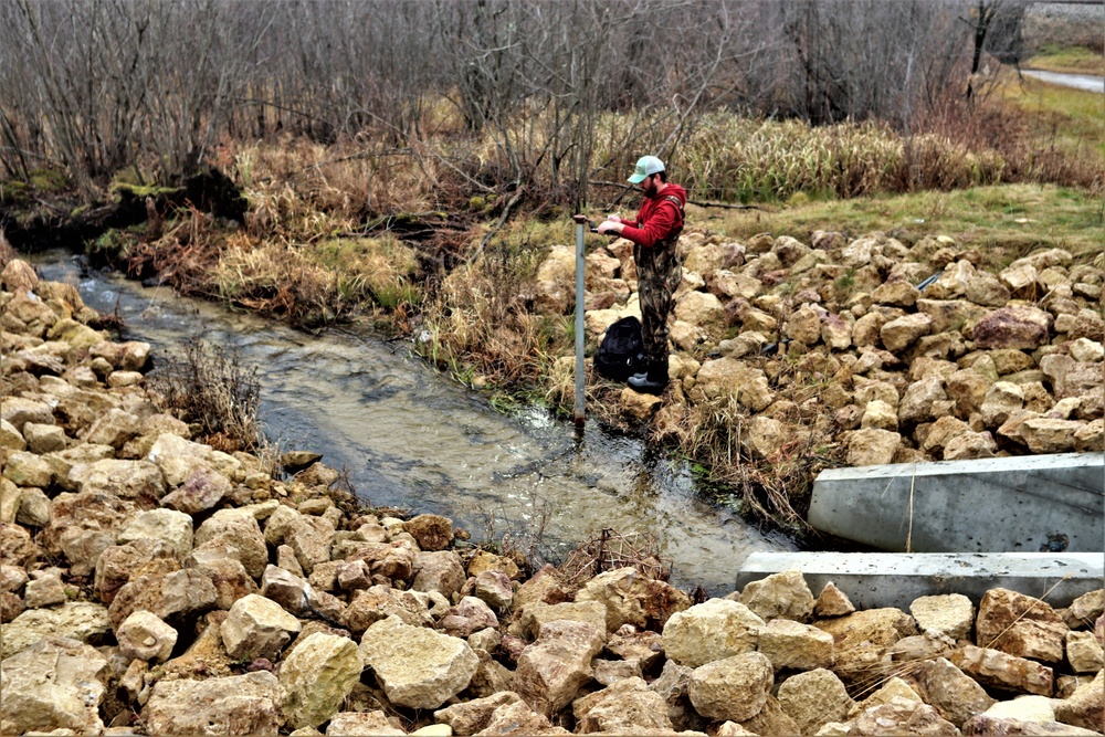 Natural-resources personnel conduct water testing at Fort McCoy