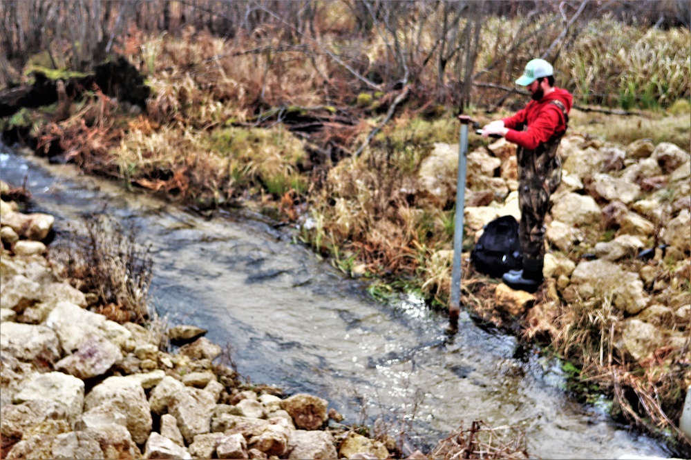 Natural-resources personnel conduct water testing at Fort McCoy