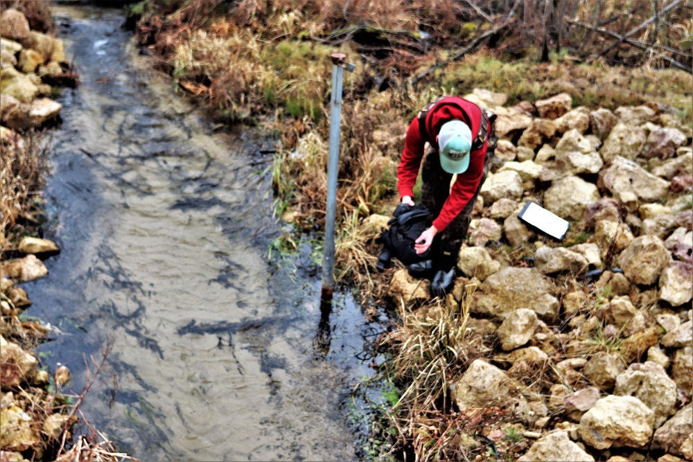 Natural-resources personnel conduct water testing at Fort McCoy