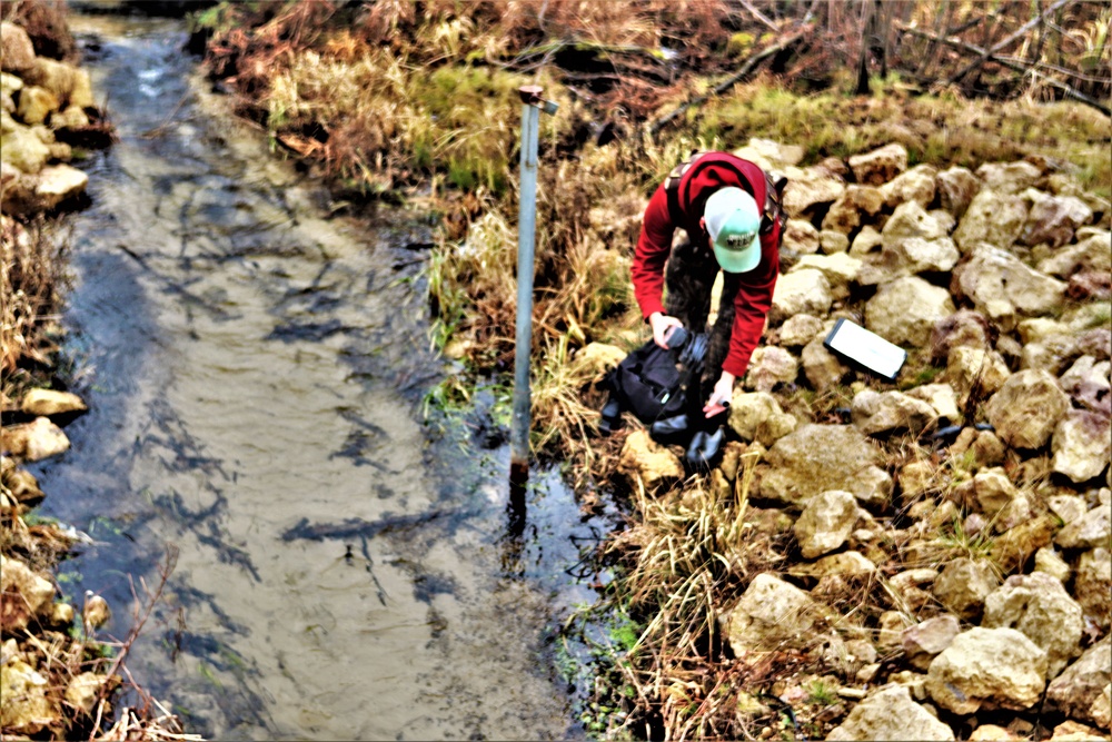 Natural-resources personnel conduct water testing at Fort McCoy