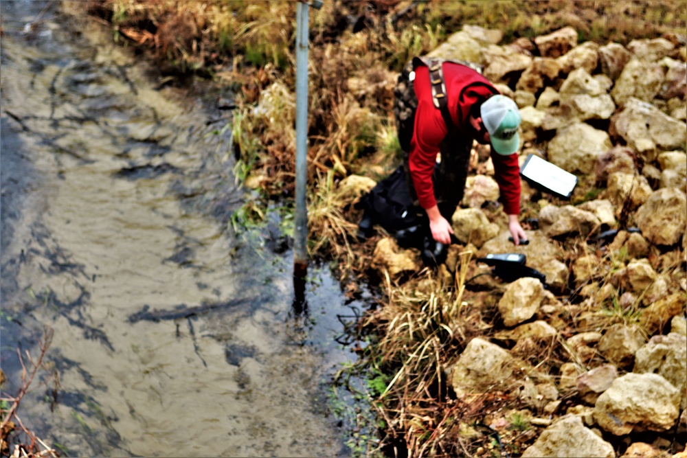Natural-resources personnel conduct water testing at Fort McCoy