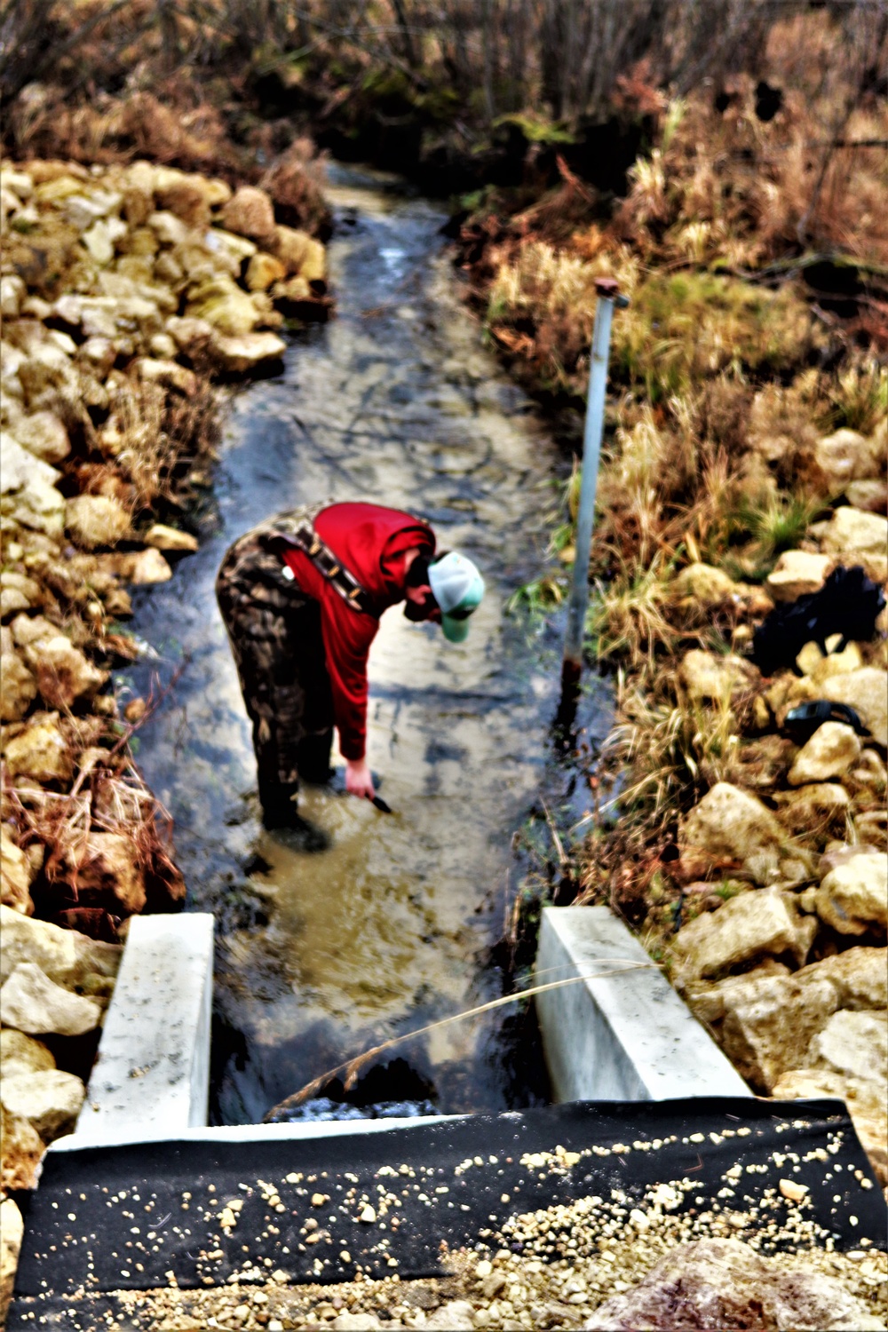 Natural-resources personnel conduct water testing at Fort McCoy