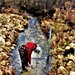 Natural-resources personnel conduct water testing at Fort McCoy