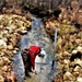 Natural-resources personnel conduct water testing at Fort McCoy