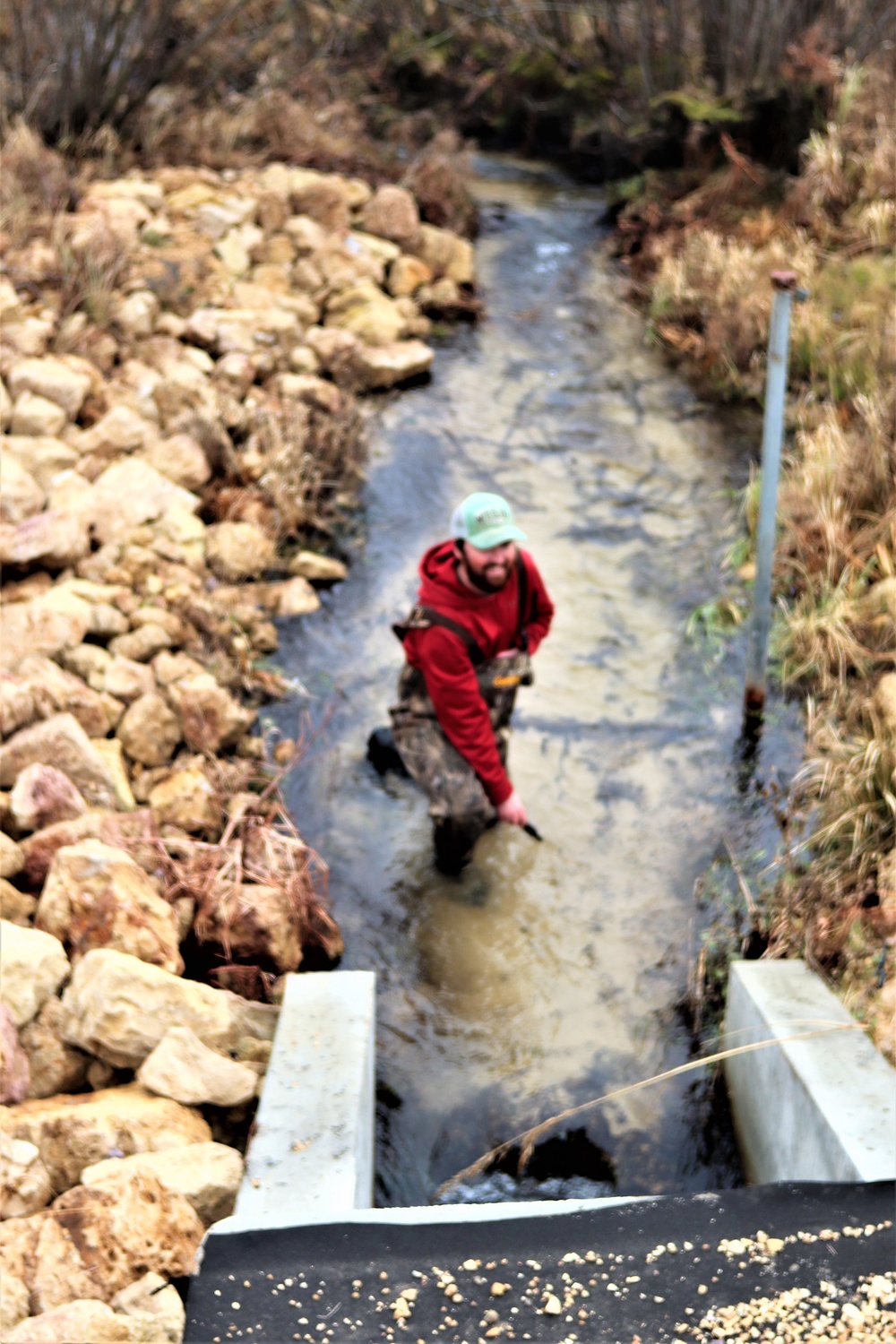 Natural-resources personnel conduct water testing at Fort McCoy