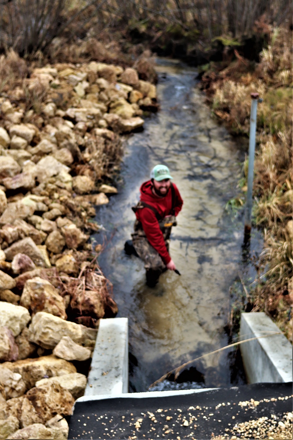 Natural-resources personnel conduct water testing at Fort McCoy