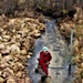 Natural-resources personnel conduct water testing at Fort McCoy