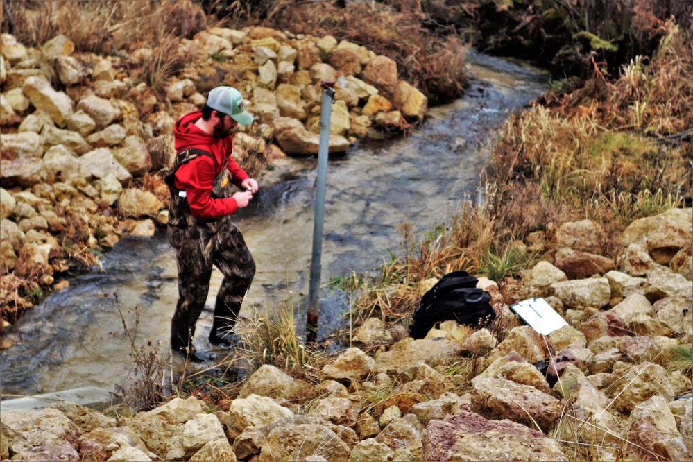 Natural-resources personnel conduct water testing at Fort McCoy