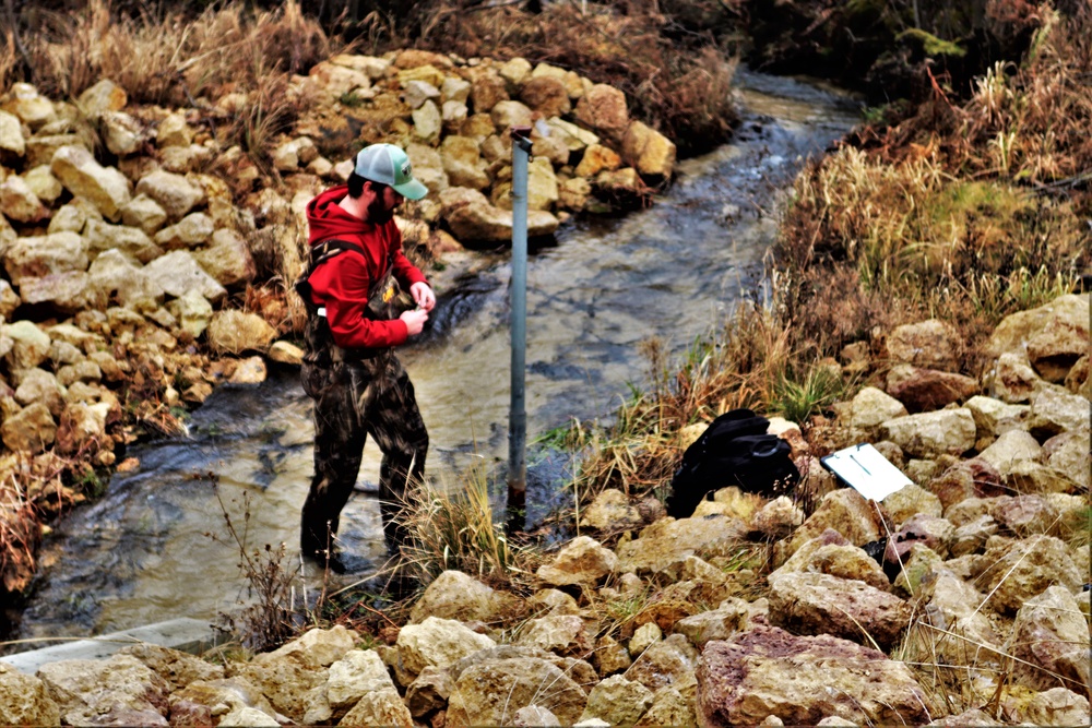 Natural-resources personnel conduct water testing at Fort McCoy