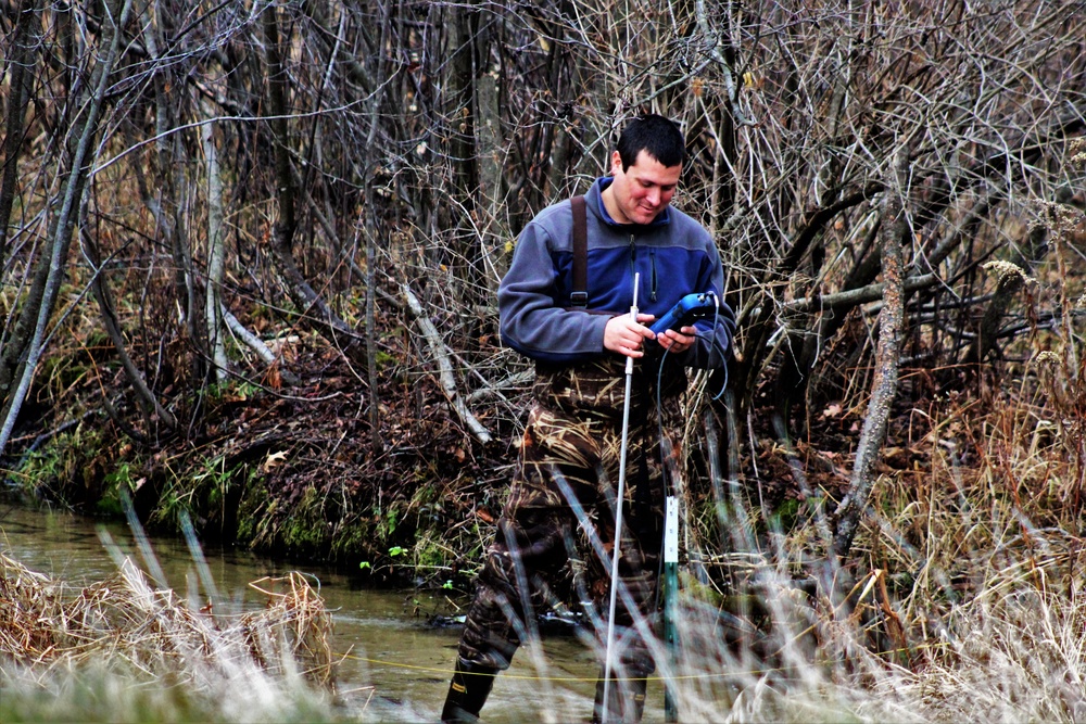 Natural-resources personnel conduct water testing at Fort McCoy