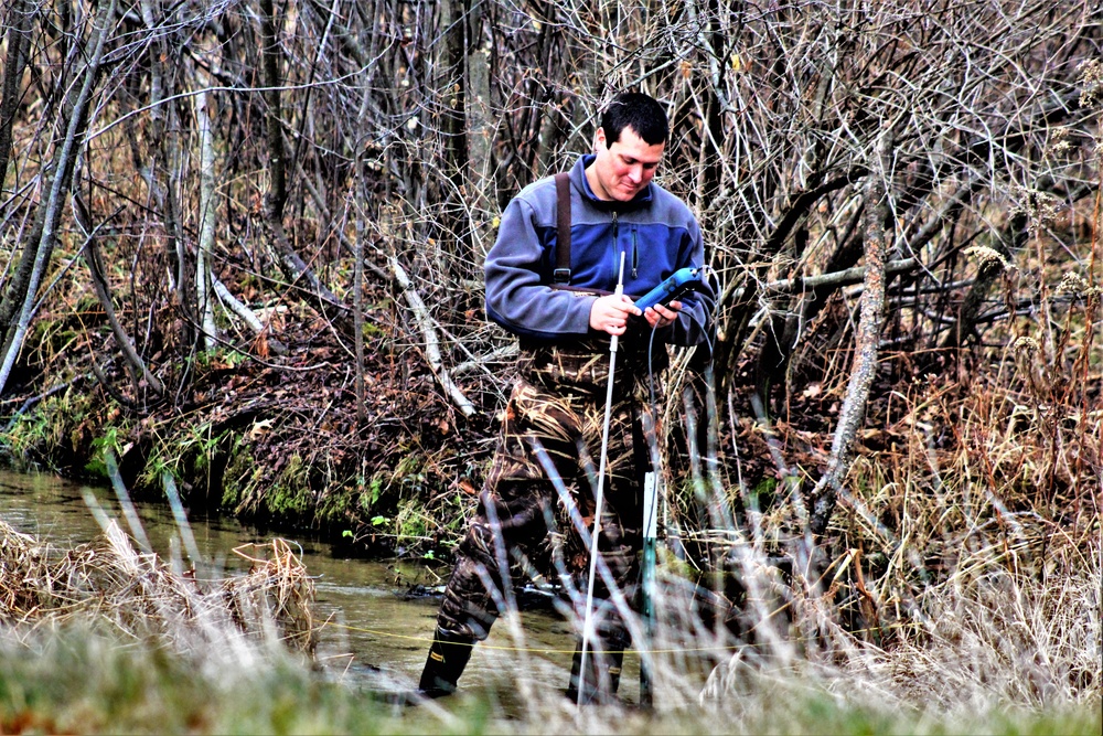 Natural-resources personnel conduct water testing at Fort McCoy
