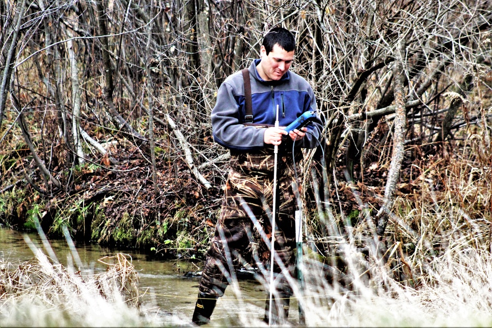 Natural-resources personnel conduct water testing at Fort McCoy