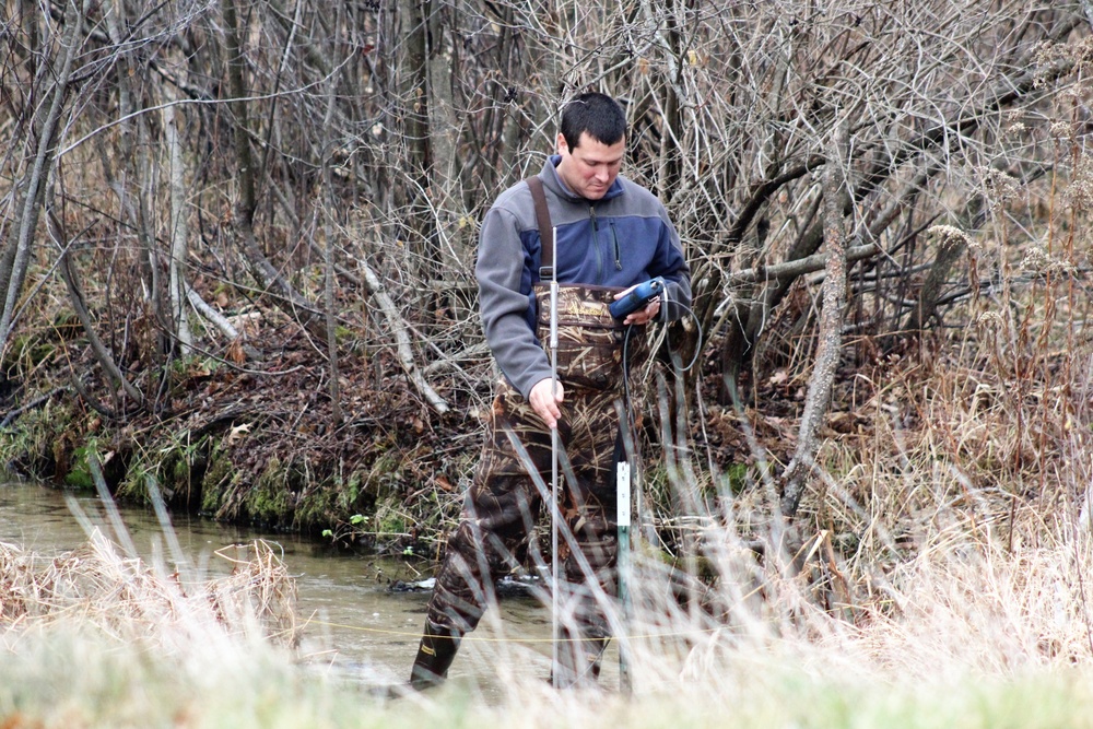 Natural-resources personnel conduct water testing at Fort McCoy
