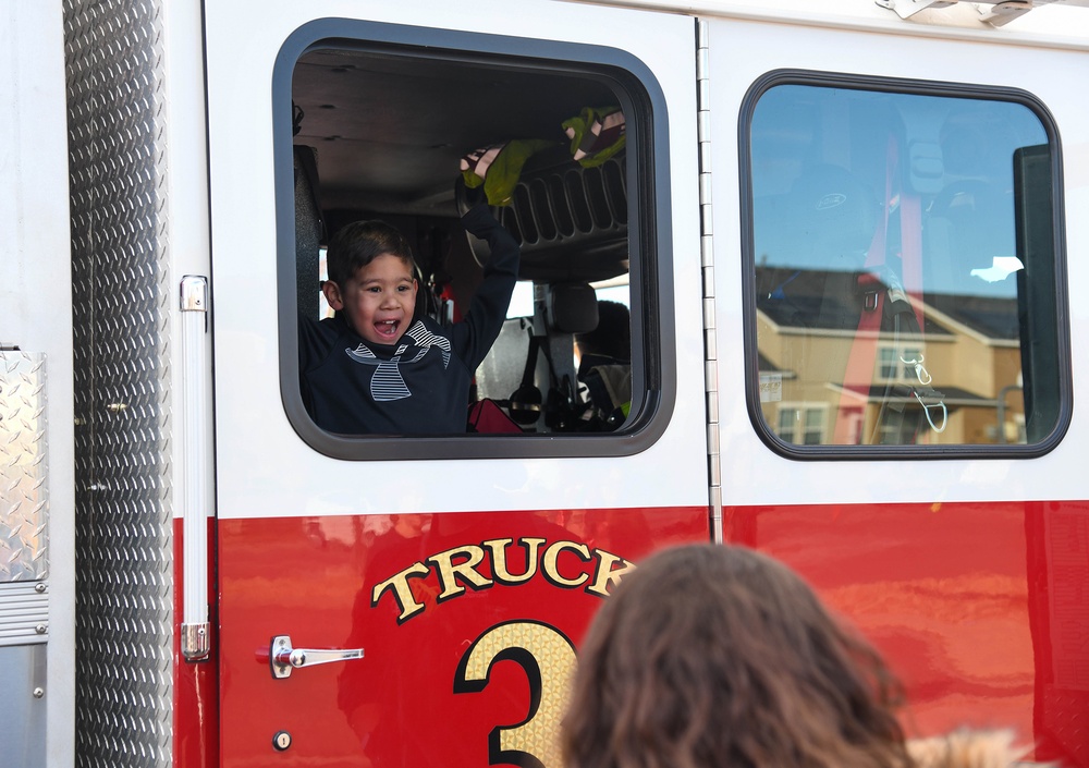 Holiday parade in Buckley Family Housing