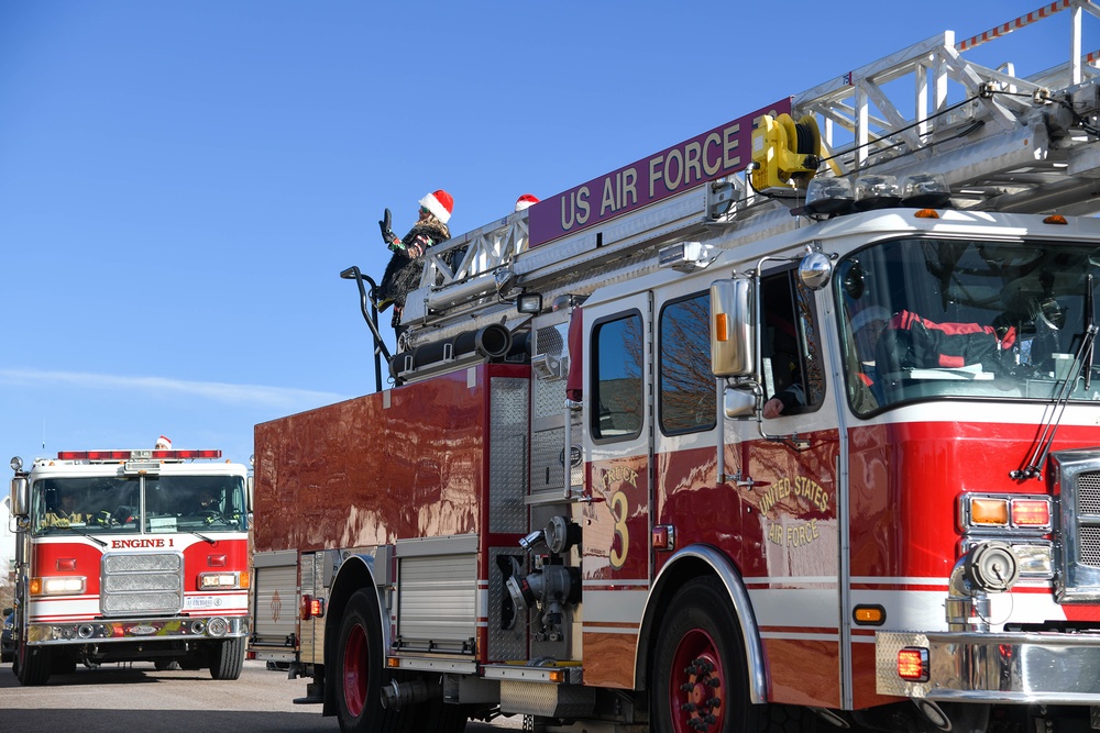 Holiday parade in Buckley Family Housing