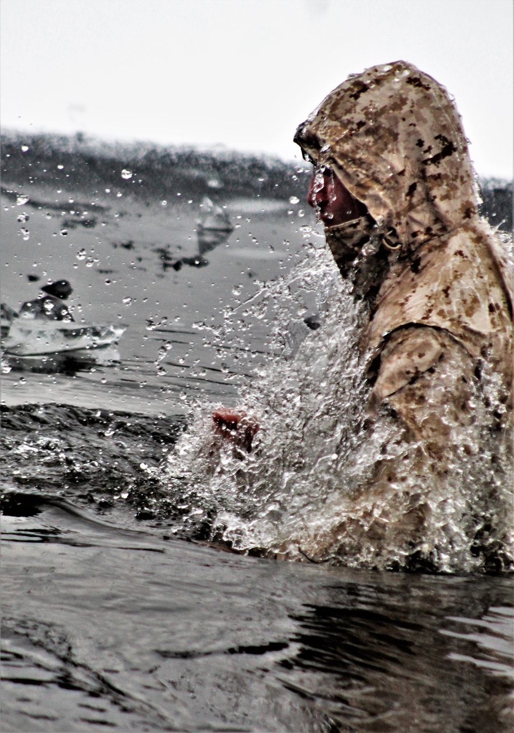 6th Marine Regiment troops jump in for cold-water immersion training at Fort McCoy