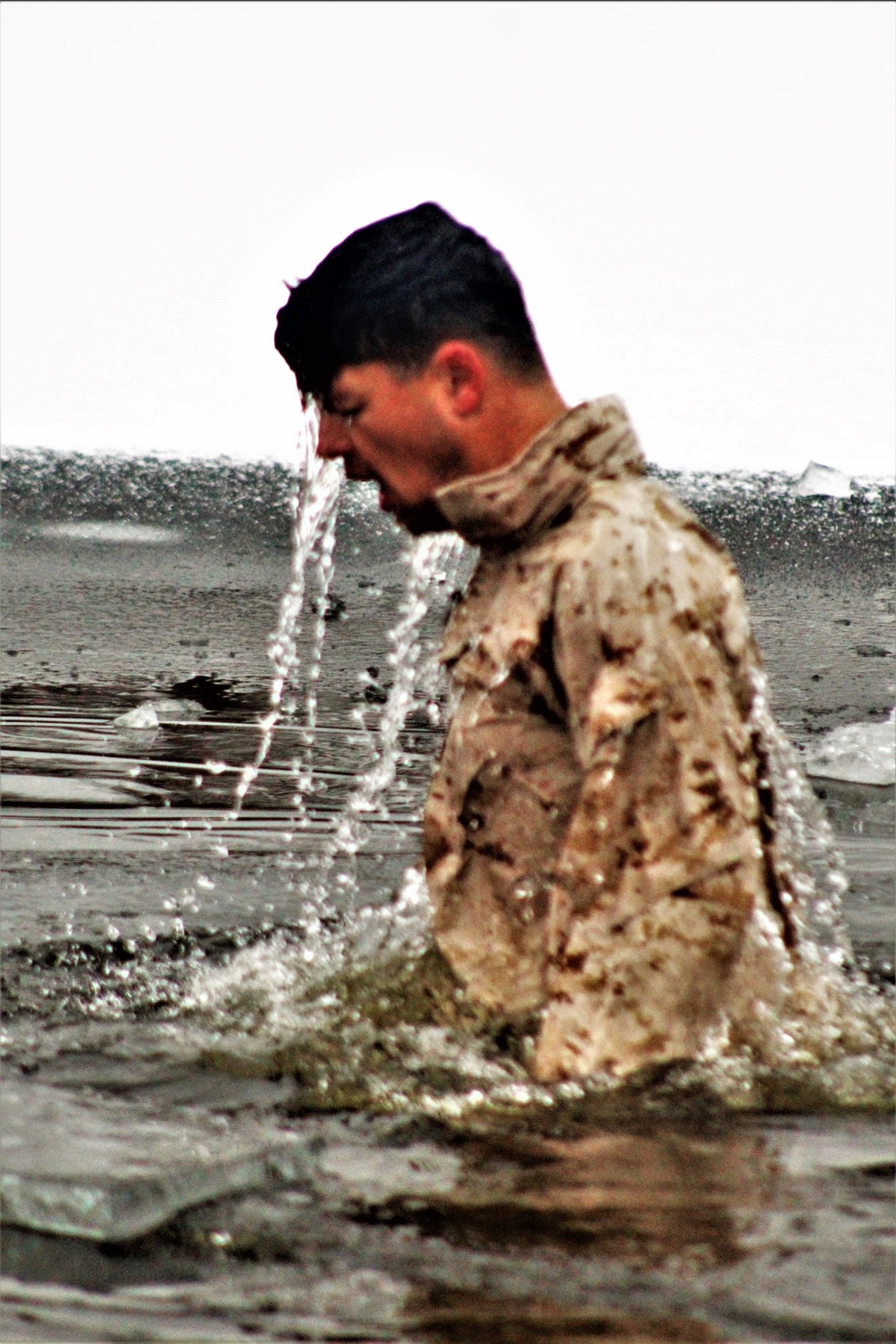 6th Marine Regiment troops jump in for cold-water immersion training at Fort McCoy