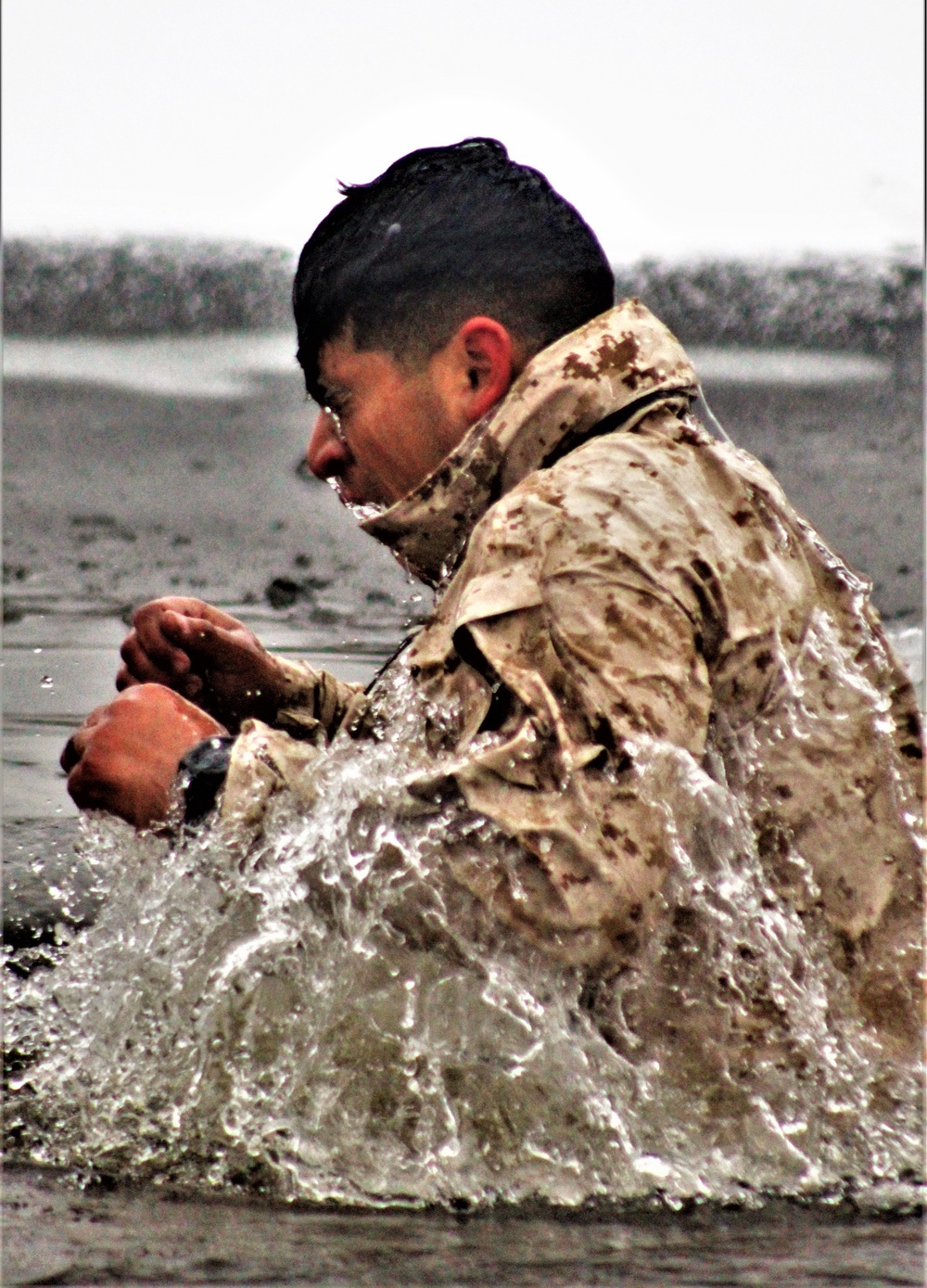 6th Marine Regiment troops jump in for cold-water immersion training at Fort McCoy