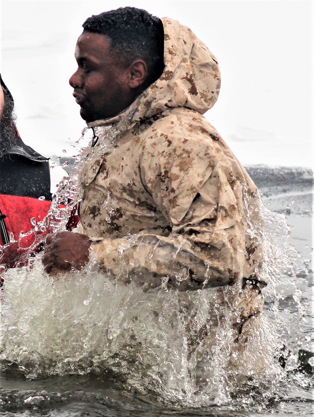 6th Marine Regiment troops jump in for cold-water immersion training at Fort McCoy