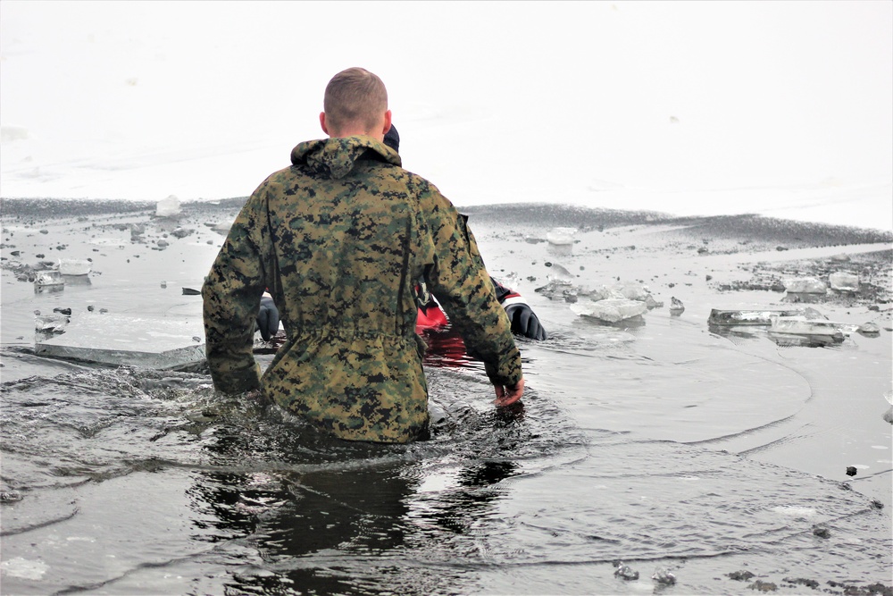 6th Marine Regiment troops jump in for cold-water immersion training at Fort McCoy