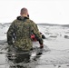 6th Marine Regiment troops jump in for cold-water immersion training at Fort McCoy