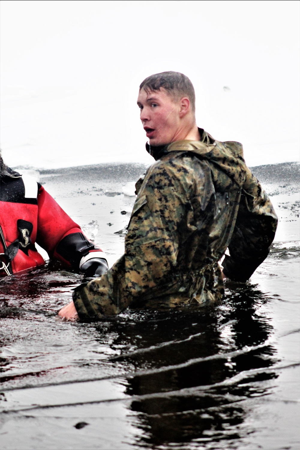 6th Marine Regiment troops jump in for cold-water immersion training at Fort McCoy