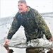 6th Marine Regiment troops jump in for cold-water immersion training at Fort McCoy