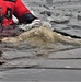 6th Marine Regiment troops jump in for cold-water immersion training at Fort McCoy