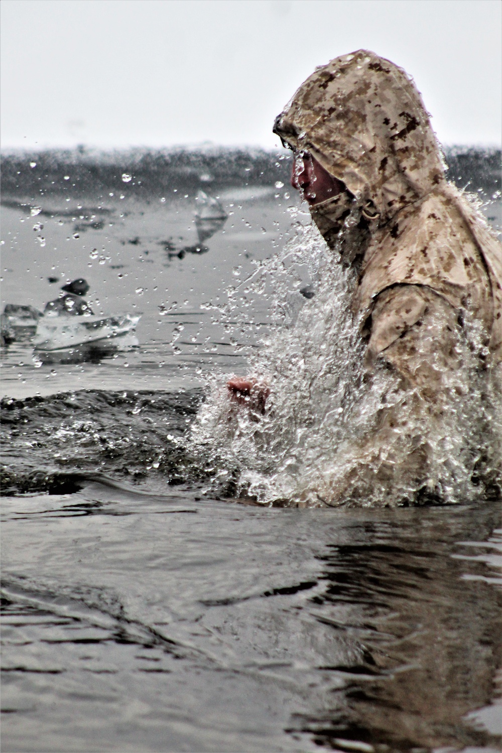 6th Marine Regiment troops jump in for cold-water immersion training at Fort McCoy