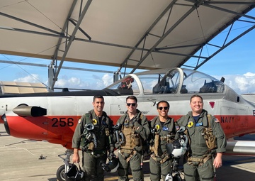 Navy pilots assist civilian aircraft in distress